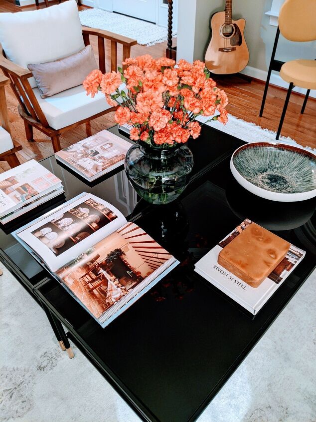 one coffee table styled 3 ways with 3 key items