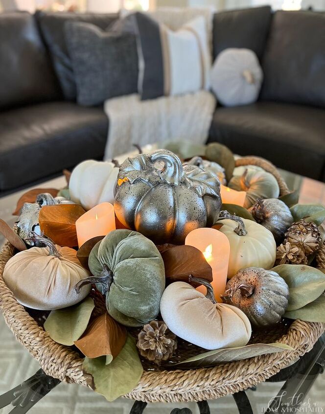 style a stunning fall coffee table centerpiece in five minutes, pumpkins and magnolia leaves in a tray