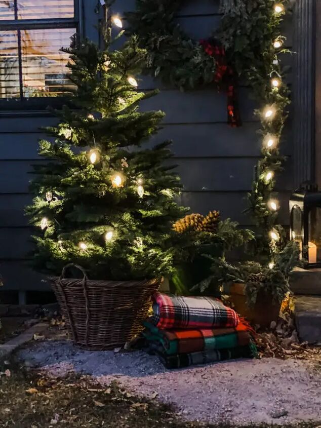 how to use baskets when decorating your home, This vintage basket was perfect for our outdoor Christmas tree See more here