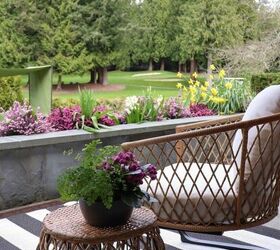 how to make your backyard special with outdoor lighting, woven chairs with side table facing golf course