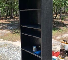 garage makeover ideas, A before picture of an old book case repurposed for a gardening station