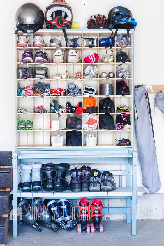 the best tips to an organized and functional garage, An old postal sorter is used to organize shoes boots roller skates gloves and helmets