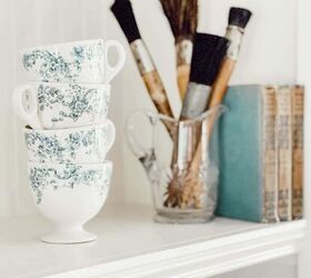 Her secret to a stylish bookshelf? Thrifted treasures and a pop of blue