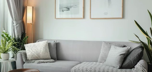 white paint colors, Warm white walls with gray and blue furniture