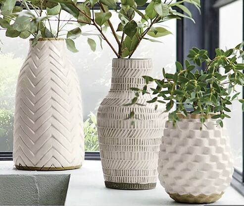 Pots and vases filled with greenery