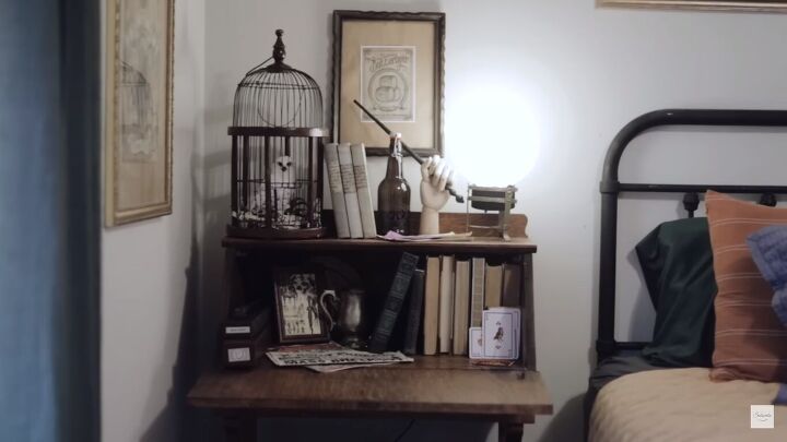 harry potter room decor, Desk to the left of the bed with an owl cage