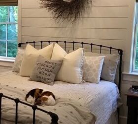 Master bedroom with a shiplap feature wall