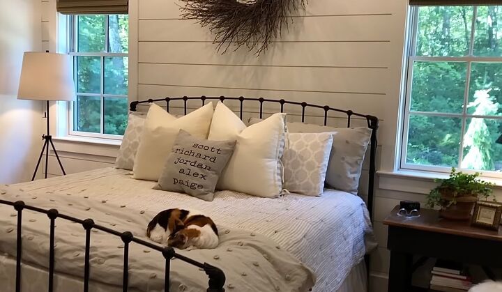 Master bedroom with a shiplap feature wall