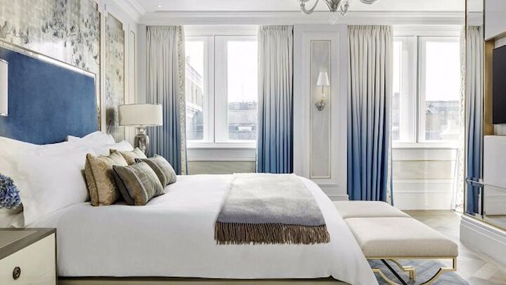decorate bedroom like luxury hotel, Overlay stash on a bed