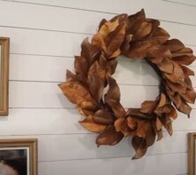 DIY magnolia wreath on a picture wall