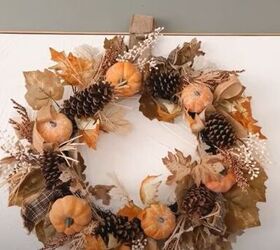 decorate mantel for fall, Fall wreath on top of a canvas