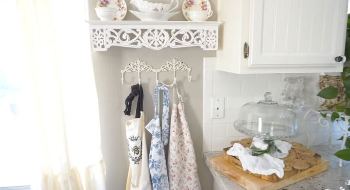 french country kitchen, French country kitchen cabinets and aprons hung up