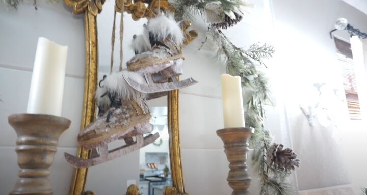 Hanging ice skates over the mirror