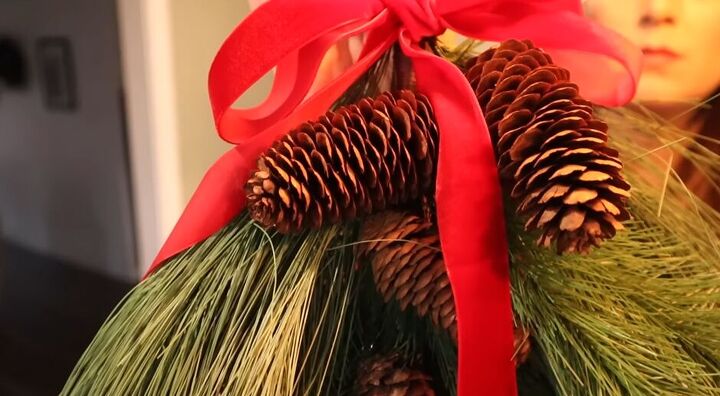 Swag with pine, pine cones, and red velvet ribbon
