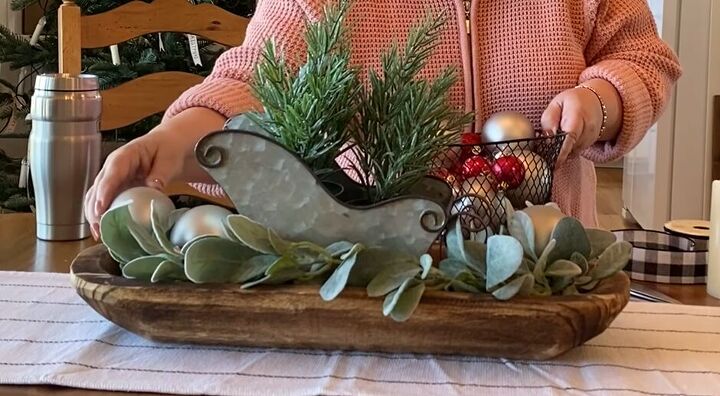 Adding silver ornaments to the dough bowl display