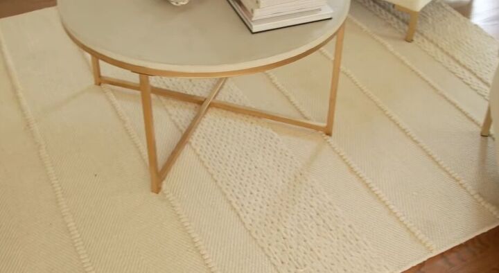 Woven rug under a coffee table