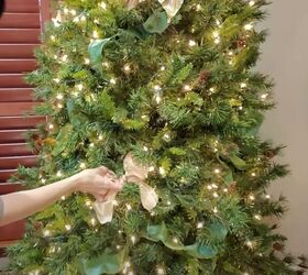 cozy christmas decor, Placing bows on the tree