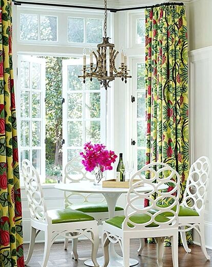 Bay window with a table and chairs