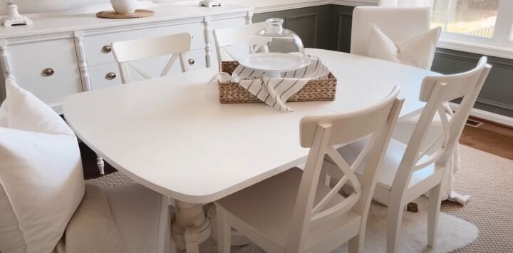 Casual white chairs around the dining table