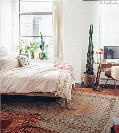 how to decorate boho, Layering rugs in a bedroom