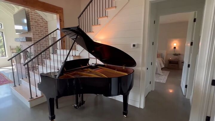 Stairway hall with a grand piano