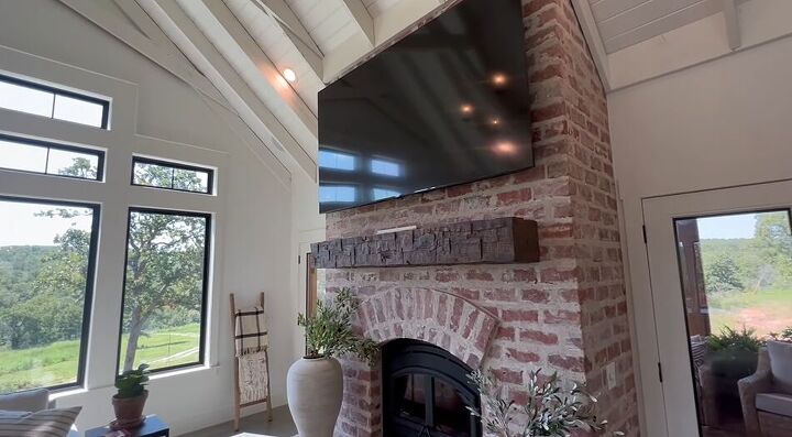 Brick fireplace and rustic mantle