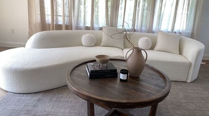 luxury living room, Sofa with round pillows and styled coffee table