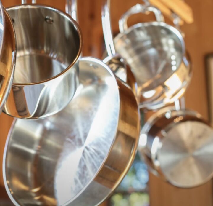 kitchen design mistakes, Pots hanging on a rack