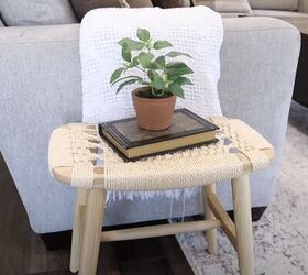 Ottoman stool with a book and planter