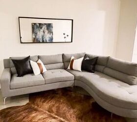 how to make a small space look bigger, Mismatched pillows on the sofa