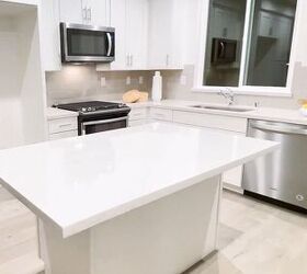 how to make a small space look bigger, Plain white kitchen with an island