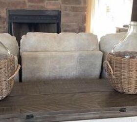 Console table with demijohn jars 