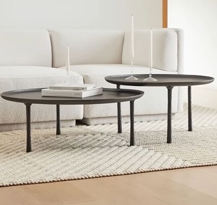 Grouping coffee tables of different sizes together