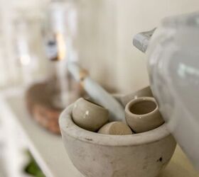 The problem with open shelves and how she fixes it