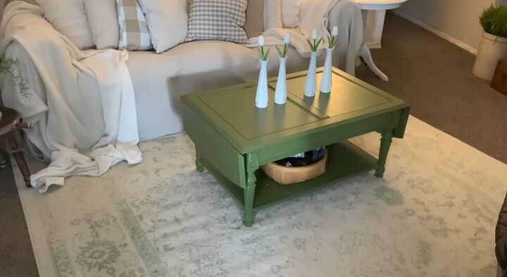 Green coffee table on a rug