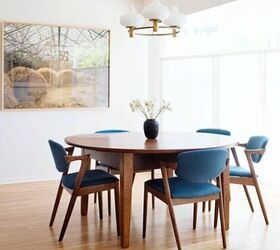 Mid-century modern dining area with a pop of blue
