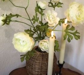 Vignette with flowers and battery-operated candles