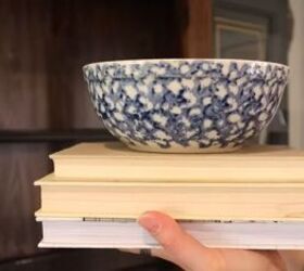 spring dining room decor, Stack of books with a blue bowl