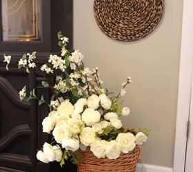 spring dining room decor, White flowers in a basket beside the hutch