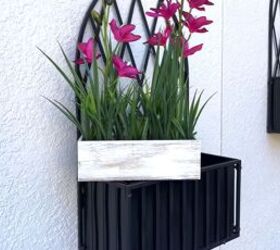 front porch decor for spring, Adding plants to the wall planters