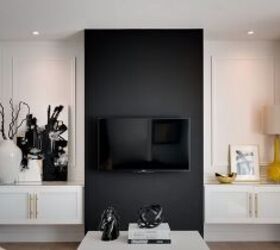 decorating around a tv, Dark segment of a white wall disguises the TV