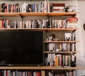 decorating around a tv, TV in a bookcase