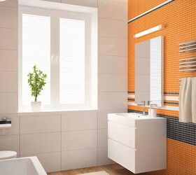 Bold orange accent color in a bathroom