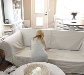 clean and decorate with me, Adding a slipcover to the sofa