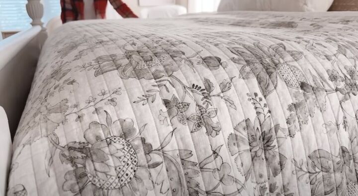 Pretty quilt on a bed