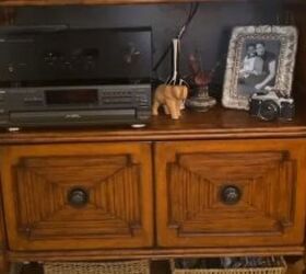 afro boho living room, Tommy Bahama etagere holding a record collection