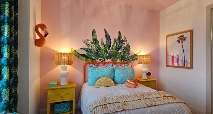 Tropical theme plant decals on pink accent wall