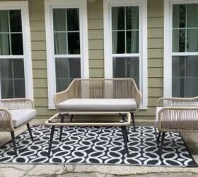 This elegant porch has some adorable farm-like qualities