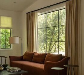 hang curtains high and wide for a spacious look