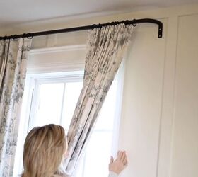 Hang your curtains like THIS to make your window look bigger